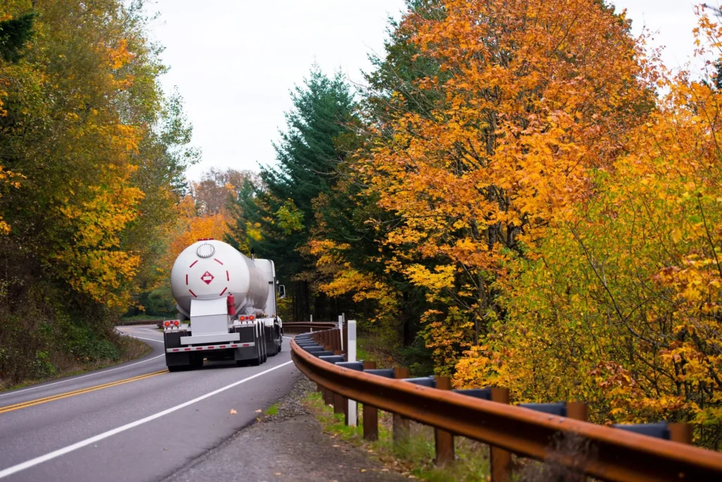 propane delivery truck driving down road