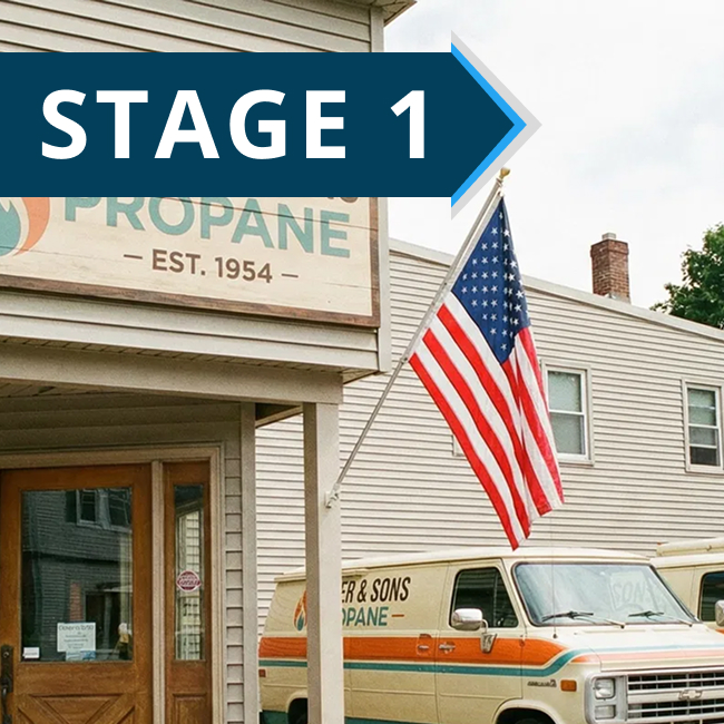 A storefront with an American flag and a sign reading “PROPANE EST. 1954,” part of which is obscured. In the background, a van with “PROPANE” written on it is parked. A large STAGE 1 banner overlays the image.